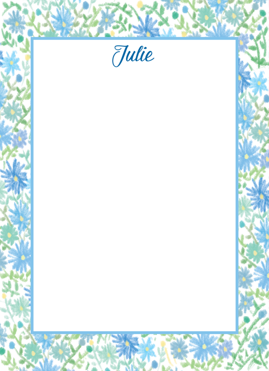Blue and green floral notepad with single line blue border. 'Julie' written in script font in blue at top. Name can be personalized to your liking. 