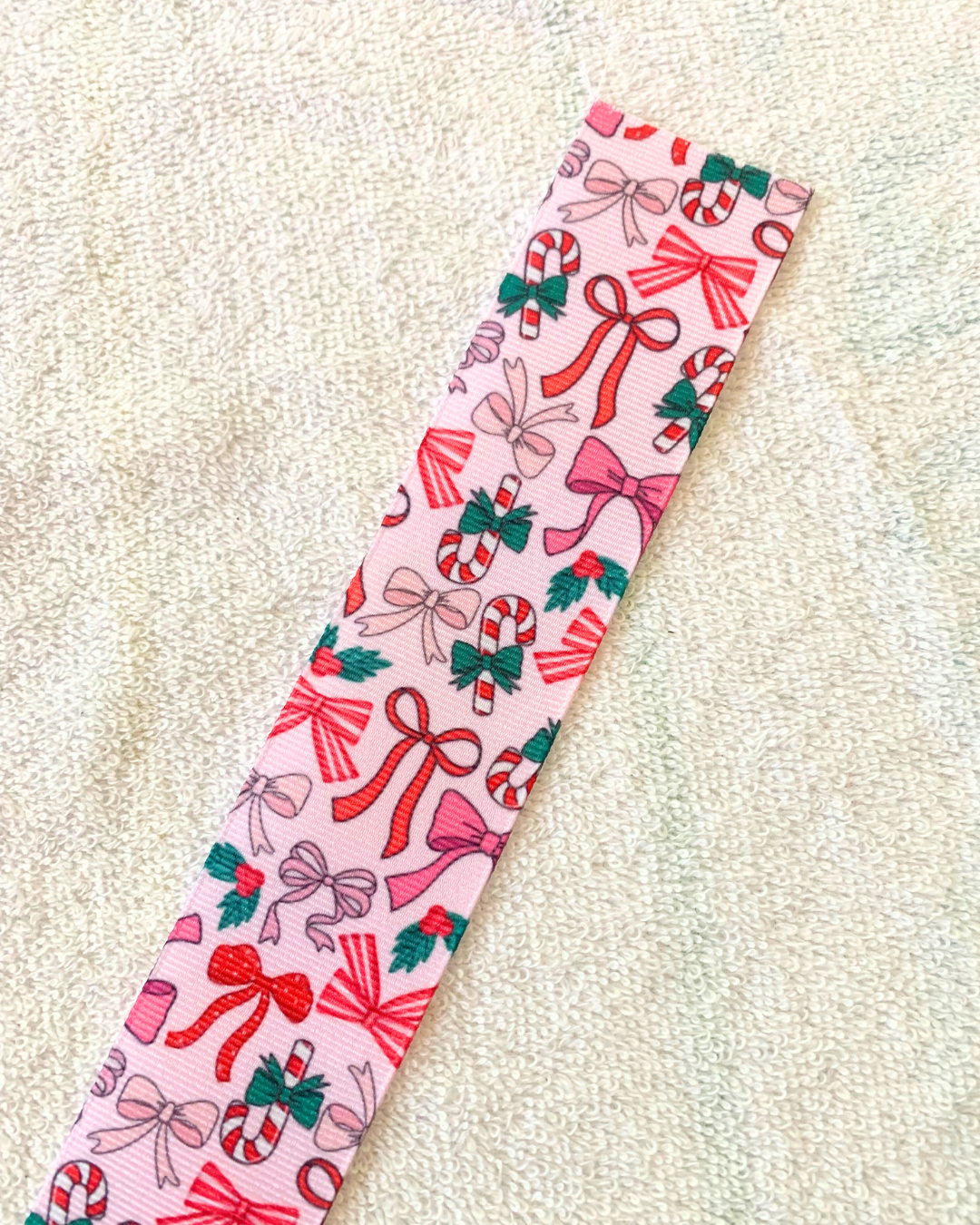 Embroidered bows design hair ribbon.